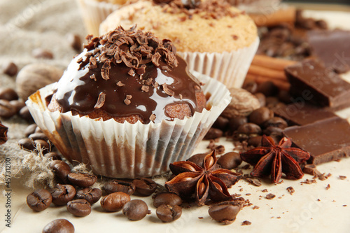Photo: tasty muffin cakes with chocolate, spices and coffee seeds, tasty muffin cakes with chocolate, spices and coffee seeds,