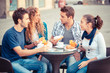 Group of Friends Having a Traditional Italian Breakfast
