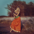 Girls of hippie in the field