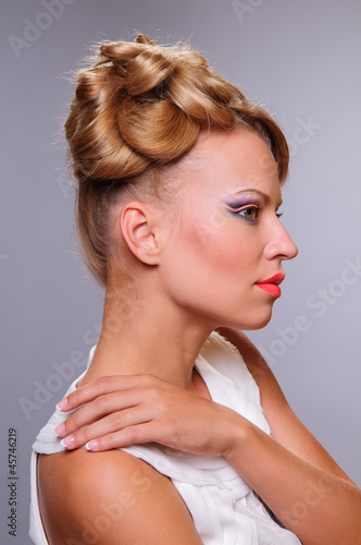 Photo: Portrait of young beautiful woman Portrait of young beautiful woman