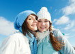 group of happy young people in winter