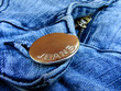 Photo: blue denim fragment with button blue denim fragment with button