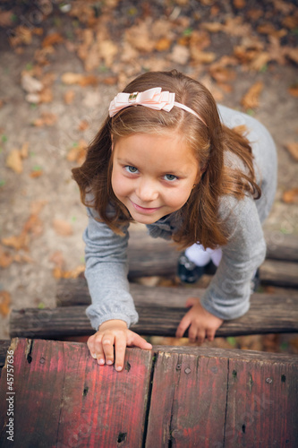 Photo: Portrait of a beautiful liitle girl close-up Portrait of a beautiful liitle girl close-up