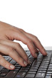human hand typing on laptop close up