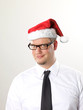 Foto: Geschäftsmann mit Weihnachtsmütze Geschäftsmann mit Weihnachtsmütze