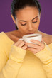 Photo: Woman drinking a cup of coffee Woman drinking a cup of coffee