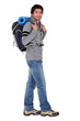 Male backpacker in studio