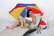 Woman laying on sun lounger