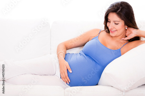 Photo: Pregnant woman relaxing Pregnant woman relaxing