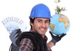 craftsman holding globe and bank notes