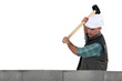 Tradesman using a mallet