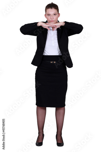 Photo: Woman stretching at the office Woman stretching at the office