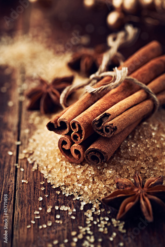 Photo: Cinnamon sticks and star anise on brown sugar Cinnamon sticks and star anise on brown sugar