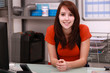 Young woman working in the office of a plumbing firm