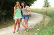 Couple of girls standing on a county path