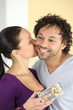 Boyfriend offering gift to girlfriend