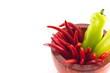 Sweet green chili and red hot chili in wooden mortar