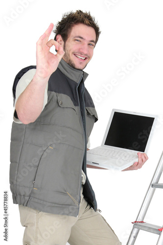 Photo: OK from a tiler with a laptop OK from a tiler with a laptop