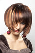 Beautiful Caucasian woman with bright hairstyle and deep look.