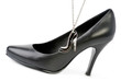 Photo: Black tall shoes and necklace Black tall shoes and necklace