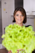 Photo: Woman holding vegetables Woman holding vegetables