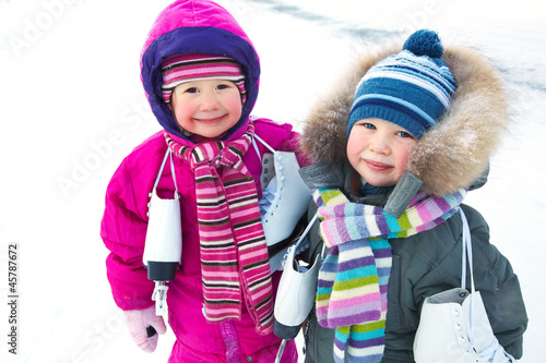 Photo: Little skaters in wintertime Little skaters in wintertime