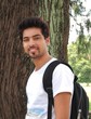 Portrait of an Indian college student outside the campus.