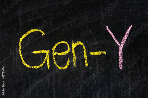Photo: The word GEN-Y handwritten with chalk on a blackboard The word GEN-Y handwritten with chalk on a blackboard