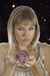 Photo: fortune teller holding a crystal ball fortune teller holding a crystal ball
