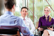 Man having an interview with manager and partner employment job
