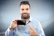 Photo: Handsome young man with smart phone Handsome young man with smart phone