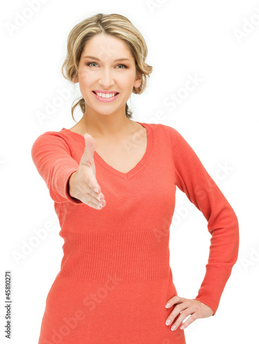 Photo: woman with an open hand ready for handshake woman with an open hand ready for handshake