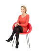 businesswoman sitting in chair