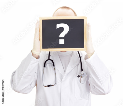 Photo: Doctor shows information on blackboard: question mark Doctor shows information on blackboard: question mark