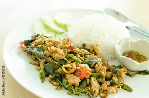 Photo: rice and chicken curry with basil leaves rice and chicken curry with basil leaves
