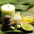 Photo: oil and orchid with green leaf oil and orchid with green leaf
