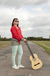 teenager mit gitarre