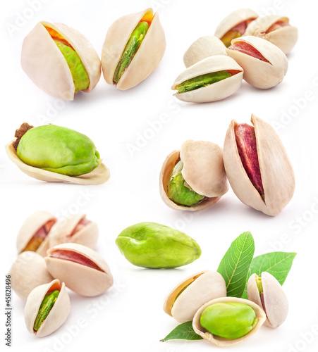 Photo: Collection of Pistachio nuts isolated on white background Collection of Pistachio nuts isolated on white background