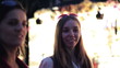 Video: Female friends walking in the old town in the evening Female friends walking in the old town in the evening