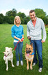Enjoying a day out with their dogs