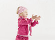 little girl with soap bubbles isolated on white