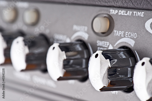Photo: controls of a guitar amplifier, making macro controls of a guitar amplifier, making macro