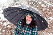 Photo: Girl with umbrella in the snow Girl with umbrella in the snow