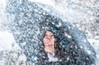 Photo: Girl with umbrella in the snow Girl with umbrella in the snow