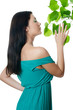 Photo: Beautiful woman with spring green leaves Beautiful woman with spring green leaves