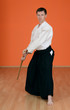 The man carries out exercises  aikido