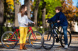 Urban biking - teens riding bikes in city