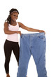 woman holding huge pants