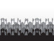 Audience silhouettes cheering at concert