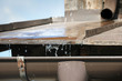 Metallic roof and draining gutter detail